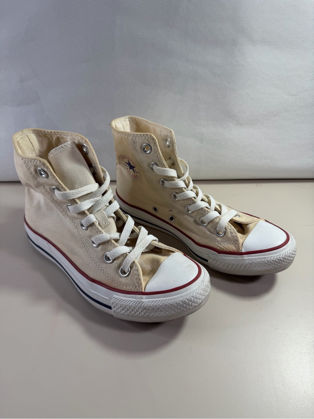 Converse High Top Sneakers in Cream with Red & Blue Trim